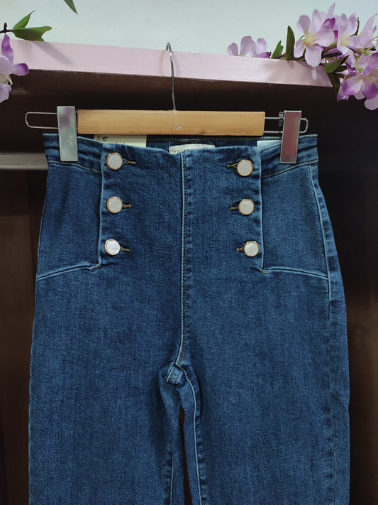 Jeans flare botones joya nacar